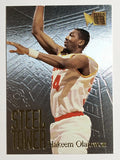 1995-96 Metal Steel Towers #6 Hakeem Olajuwon