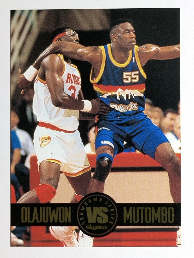 1993-94 SkyBox Premium Showdown Series #SS4 Hakeem Olajuwon/Dikembe Mutombo