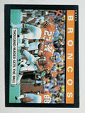 1985 Topps #235 Denver Broncos TL/Sammy Winder/John Elway (EXMT)