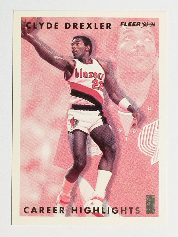 1993-94 Fleer Clyde Drexler #2 Clyde Drexler/Holding ball aloft with right hand