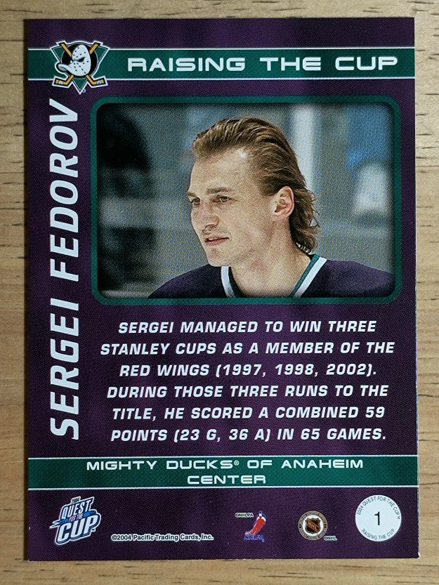 2003-04 Pacific Quest for the Cup Raising the Cup #1 Sergei Fedorov