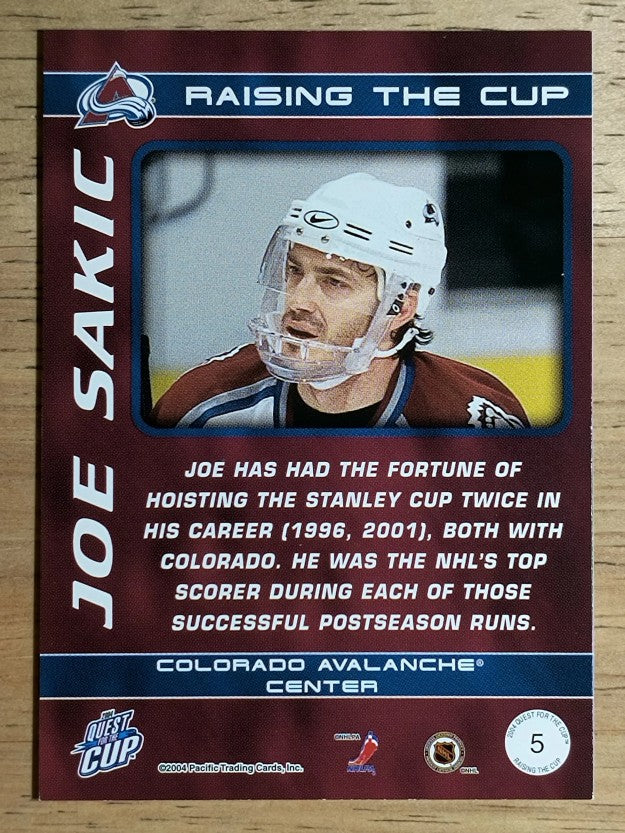 2003-04 Pacific Quest for the Cup Raising the Cup #5 Joe Sakic
