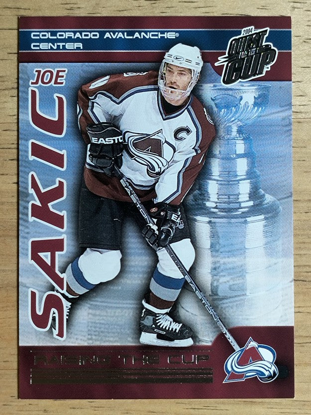 2003-04 Pacific Quest for the Cup Raising the Cup #5 Joe Sakic