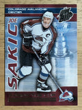 2003-04 Pacific Quest for the Cup Raising the Cup #5 Joe Sakic