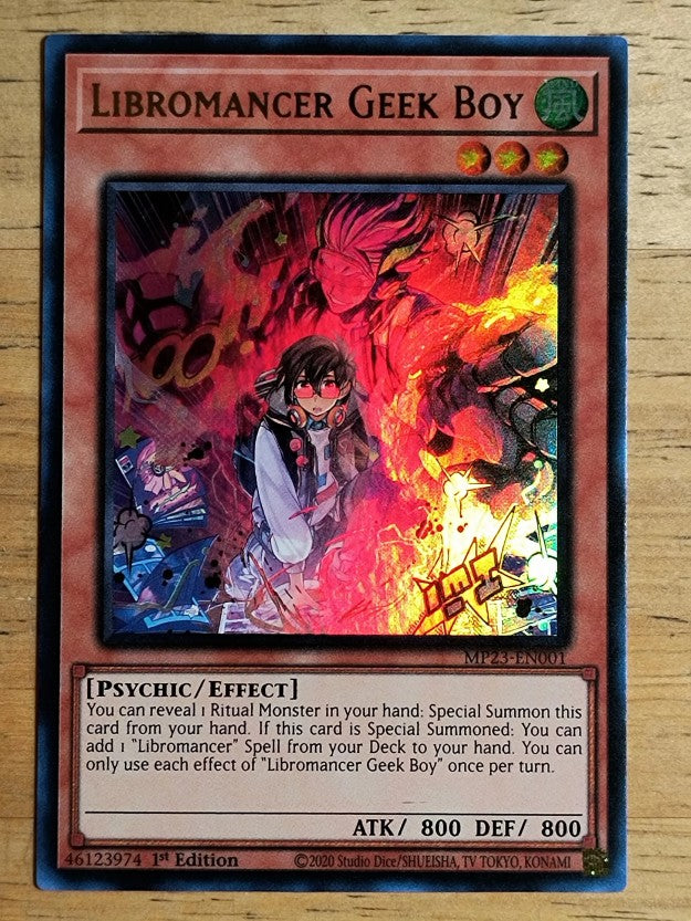 2023 Yu-Gi-Oh 25th Anniversary Tin Dueling Heroes #001 Libromancer Geek Boy UR