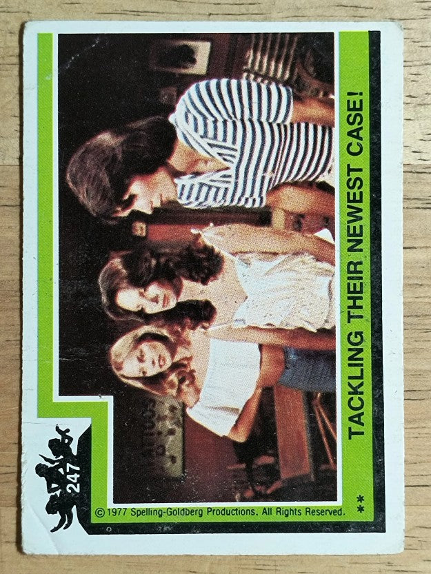1977 Topps Charlie's Angels #247 Tackling Their Newest Case (GOOD)