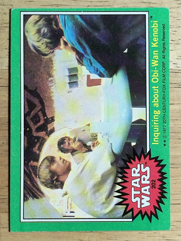 1977 Topps Star Wars #202 Inquiring about Obi-Wan Kenobi (EX)