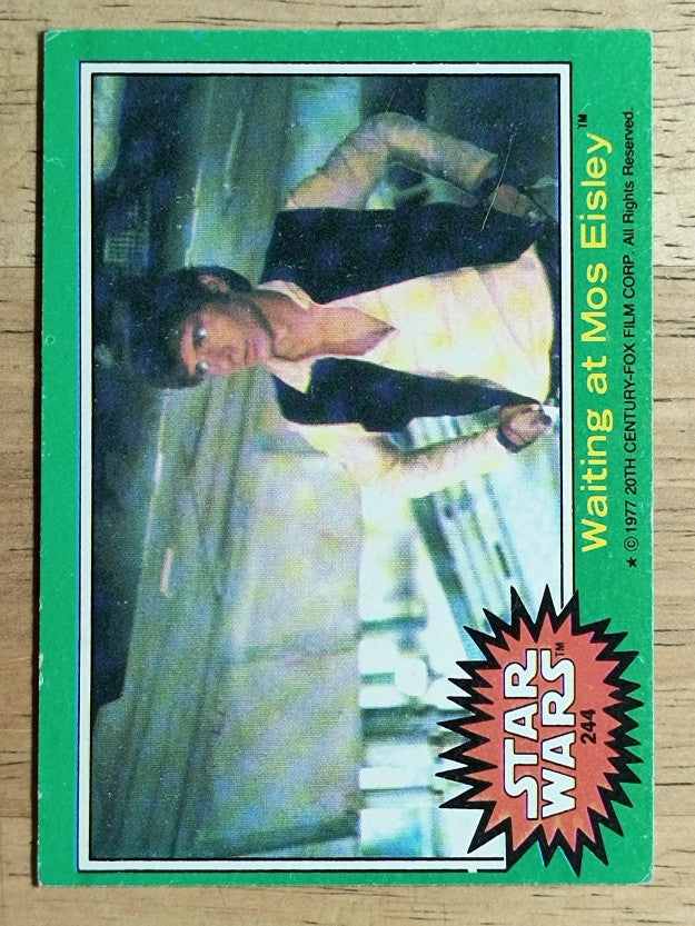 1977 Topps Star Wars #244 Waiting at Mos Eisley (EX)