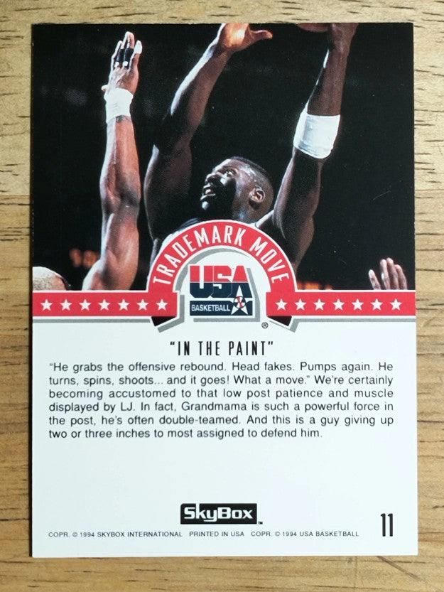 1994 SkyBox USA #11 Larry Johnson/Trademark Move