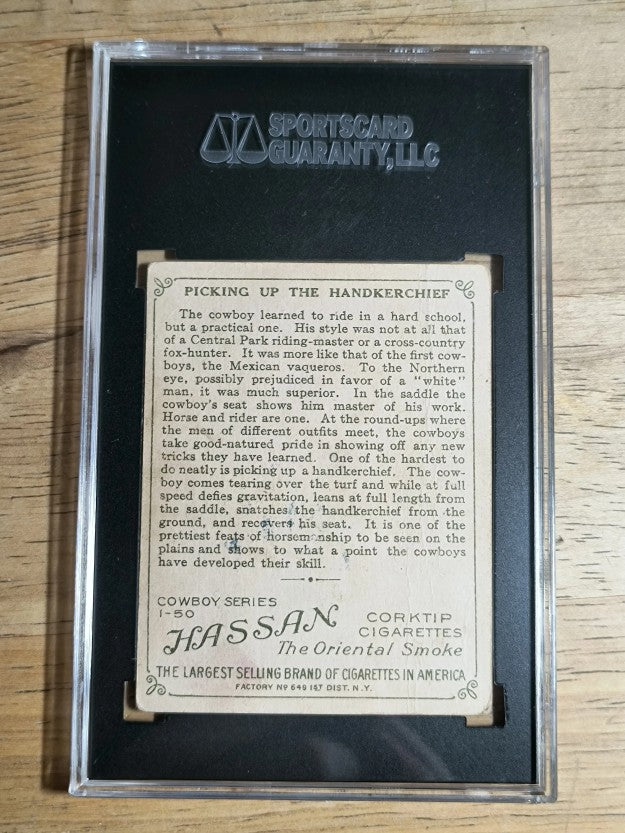 1909 Hassan Cowboy Series T53 #32 Picking Up the Handkerchief (SGC 2 GOOD)