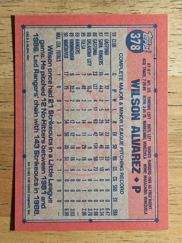 1991 Topps #378A Wilson Alvarez ERR/1990 Birmingham stat lines omitted