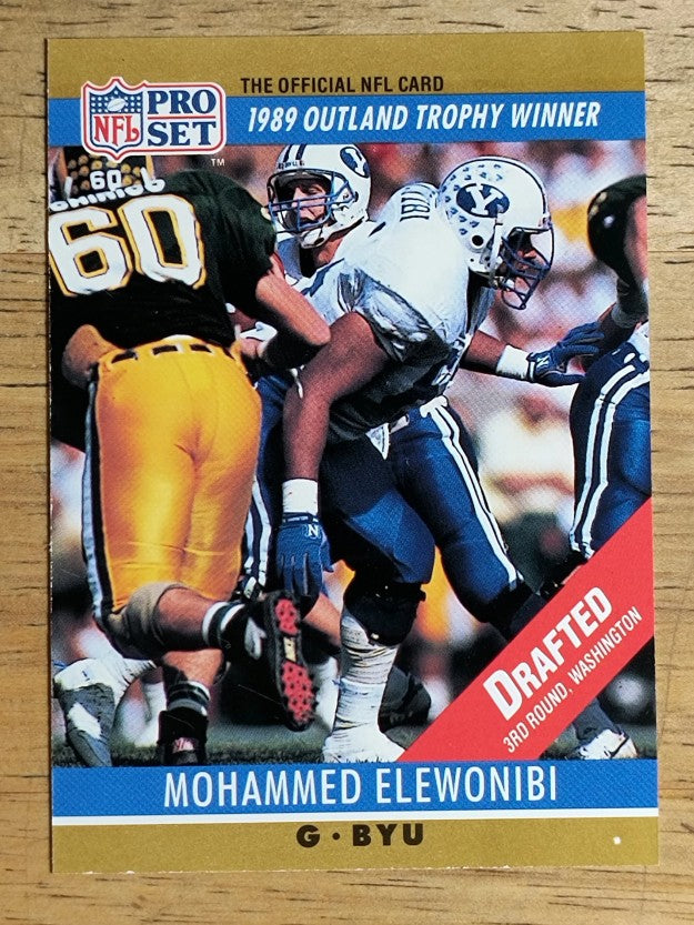 1990 Pro Set #20B Mo Elewonibi RC/Outland Trophy/Drafted stripe on card front
