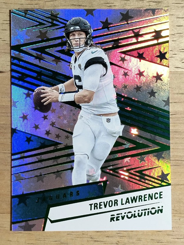 2025 Panini Revolution Green Astro #157 Trevor Lawrence