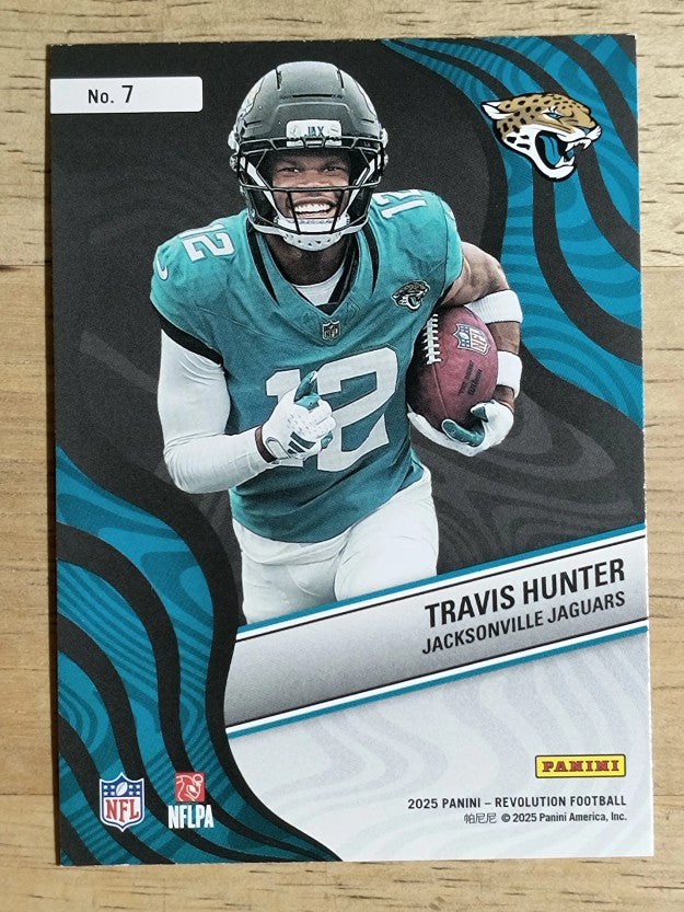 2025 Panini Revolution New Wave #7 Travis Hunter