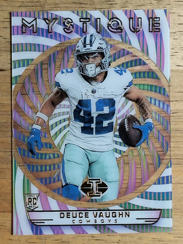 2023 Panini Illusions Mystique #8 Deuce Vaughn