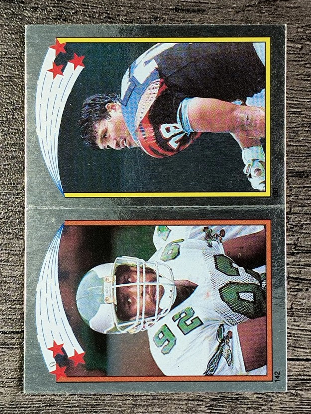 1988 Topps Stickers #142 Reggie White/ 150 Anthony Munoz AP FOIL