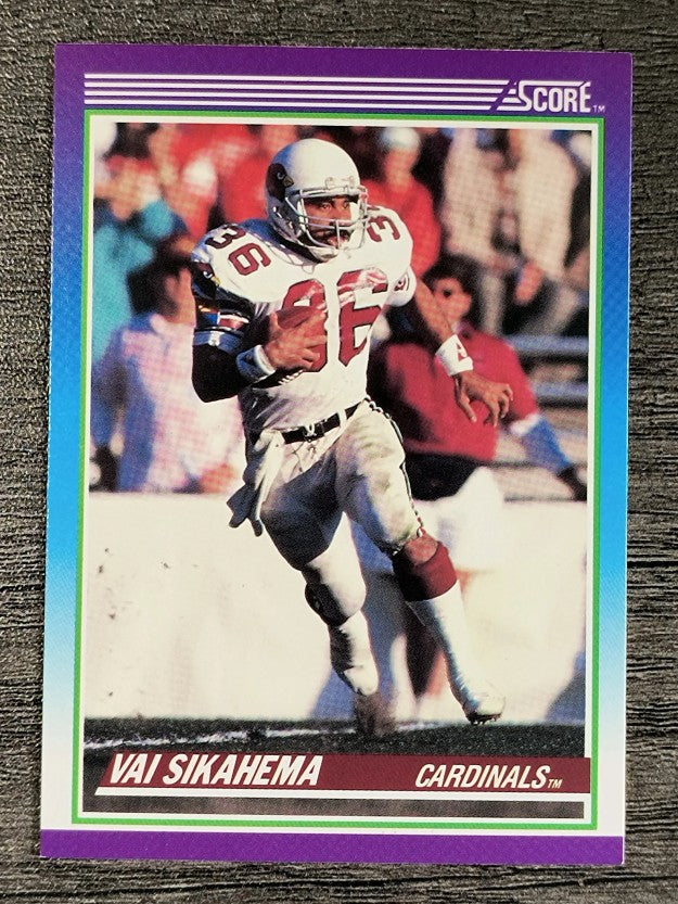 1990 Score #136A Vai Sikahema/Photo on back has helmet on