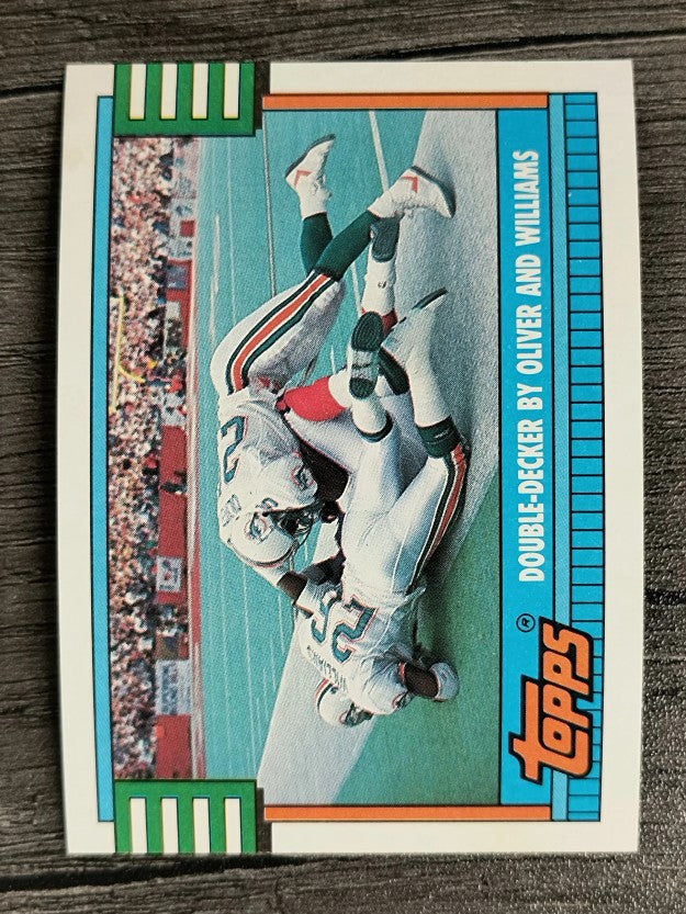 1990 Topps Disclaimer Back #512A Dolphins Team/Louis Oliver/Jarvis Williams