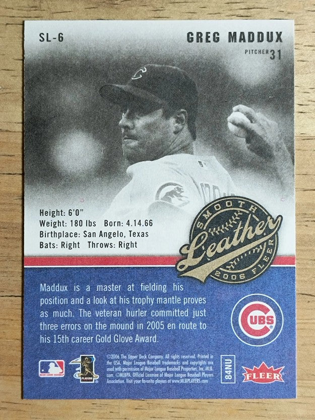 2006 Fleer Smooth Leather #SL6 Greg Maddux (NM)