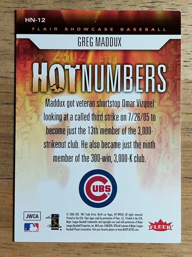 2006 Flair Showcase Hot Numbers #12 Greg Maddux