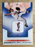 2002 E-X Behind the Numbers #27 Greg Maddux (NM)