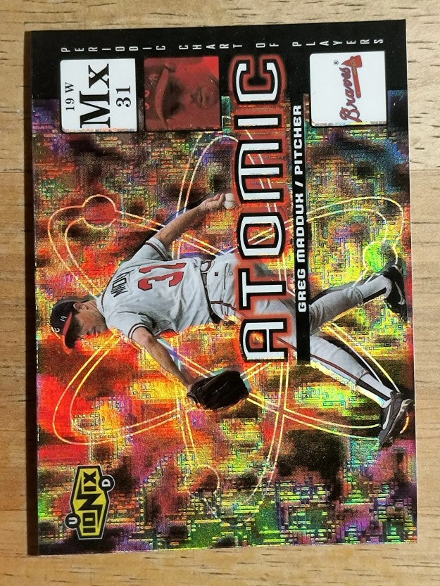 2000 UD Ionix Atomic #A5 Greg Maddux