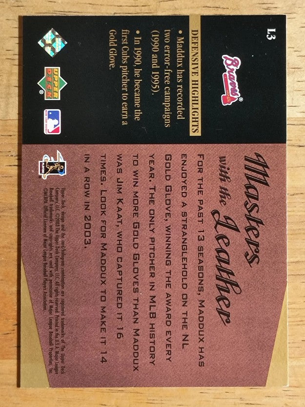 2003 Upper Deck Masters with the Leather #L3 Greg Maddux