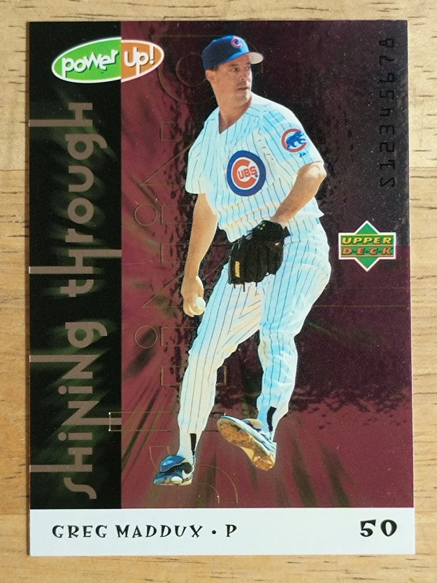 2004 Upper Deck Power Up Shining Through #52 Greg Maddux