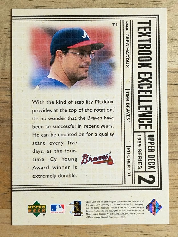 1999 Upper Deck Textbook Excellence #T2 Greg Maddux