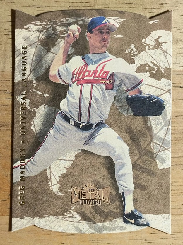 1998 Metal Universe Universal Language #12 Greg Maddux