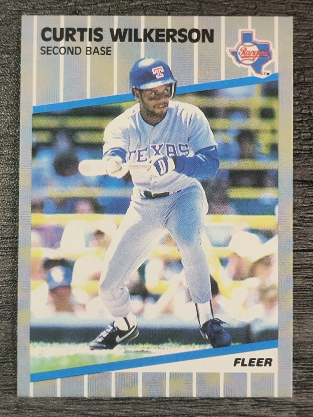 1989 Fleer #535 Curtis Wilkerson ERR/Pitcher headings at bottom