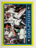 1986 Topps #44 Dolphins TL/Dan Marino Sets Up