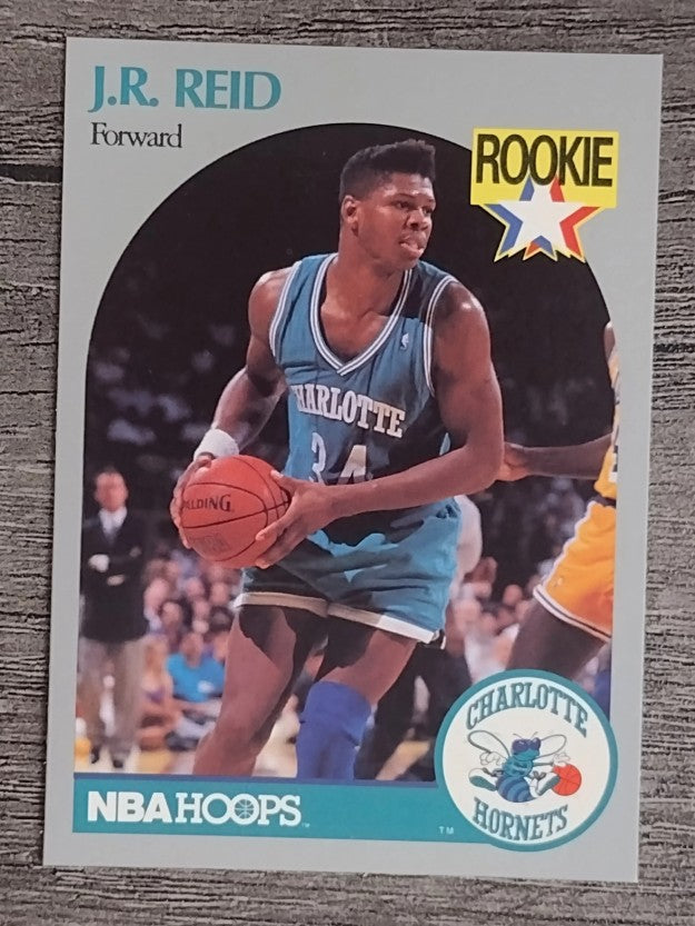 1990-91 Hoops #57 J.R. Reid RC