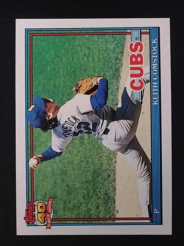 1991 Topps #337A Keith Comstock ERR/Cubs logo on front