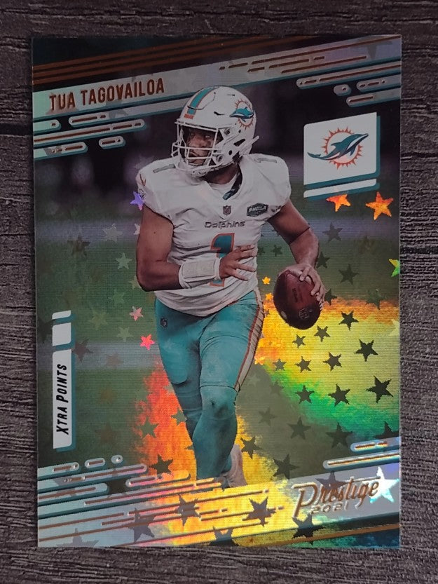 2021 Prestige Xtra Points Astral #65 Tua Tagovailoa