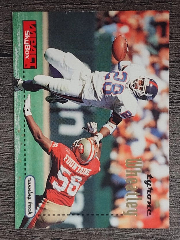 1996 SkyBox Impact #97 Tyrone Wheatley