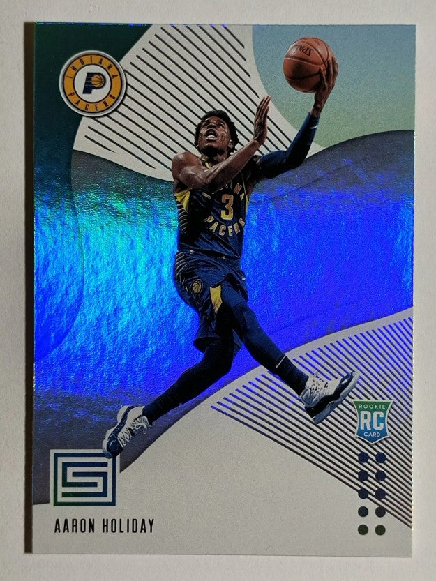 2018-19 Panini Status #130 Aaron Holiday RC