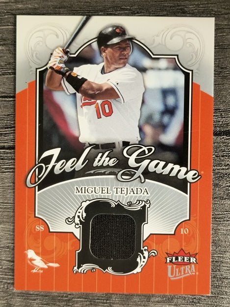2006 Ultra Feel the Game #MT Miguel Tejada Jsy (EXMT)