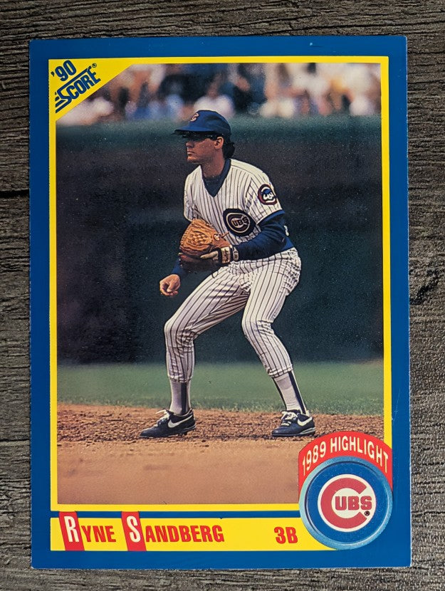 1990 Score #561A Ryne Sandberg HL ERR/Position on front listed as 3B